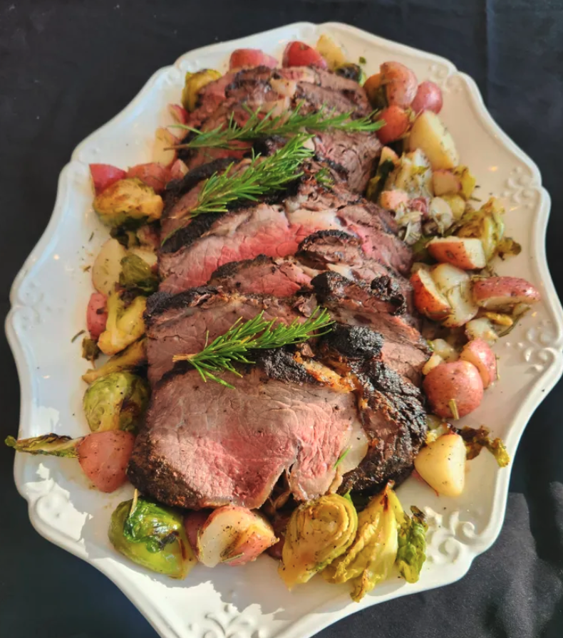 Sliced roast beef with roasted vegetables